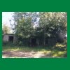 023_Tag2_RuinedHouse_onTheRoad.jpg